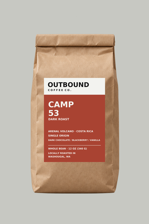 Camp 53 dark roast whole bean coffee in Outbound's oxide red label bag