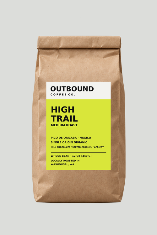 High Trail medium roast whole bean coffee in Outbound's lime label bag